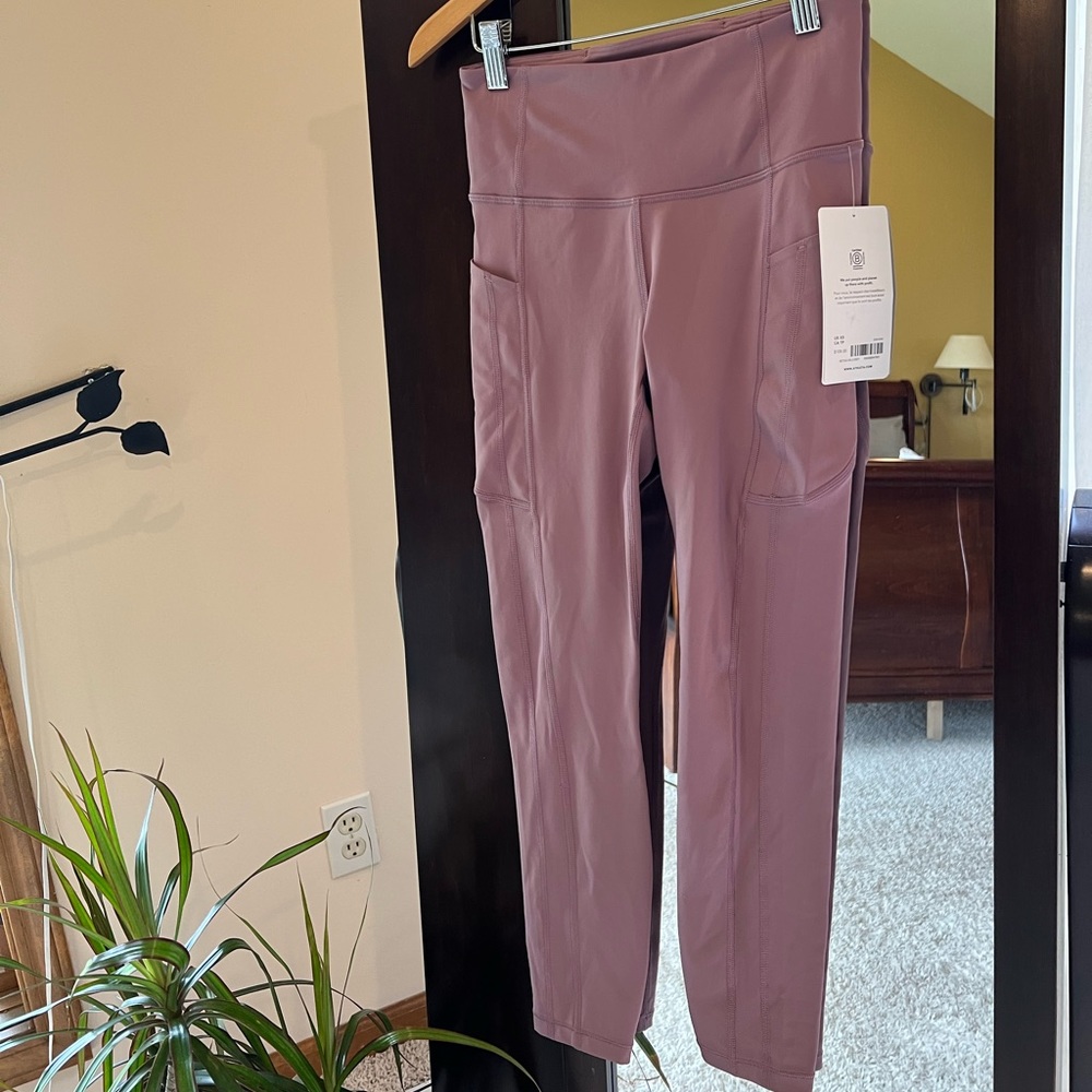 Athleta Ultimate Stash II 7/8 Tight.   Mauve Color  Sz XS